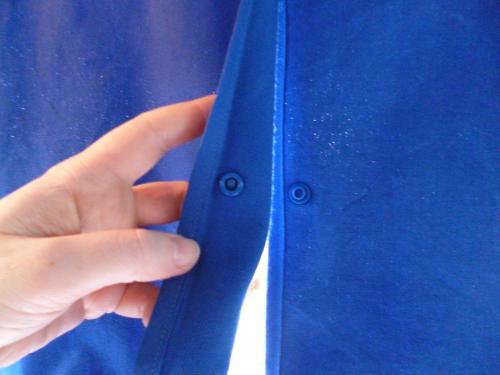 Verbindung der Vorhanghälften in der Mitte per Druckknopf